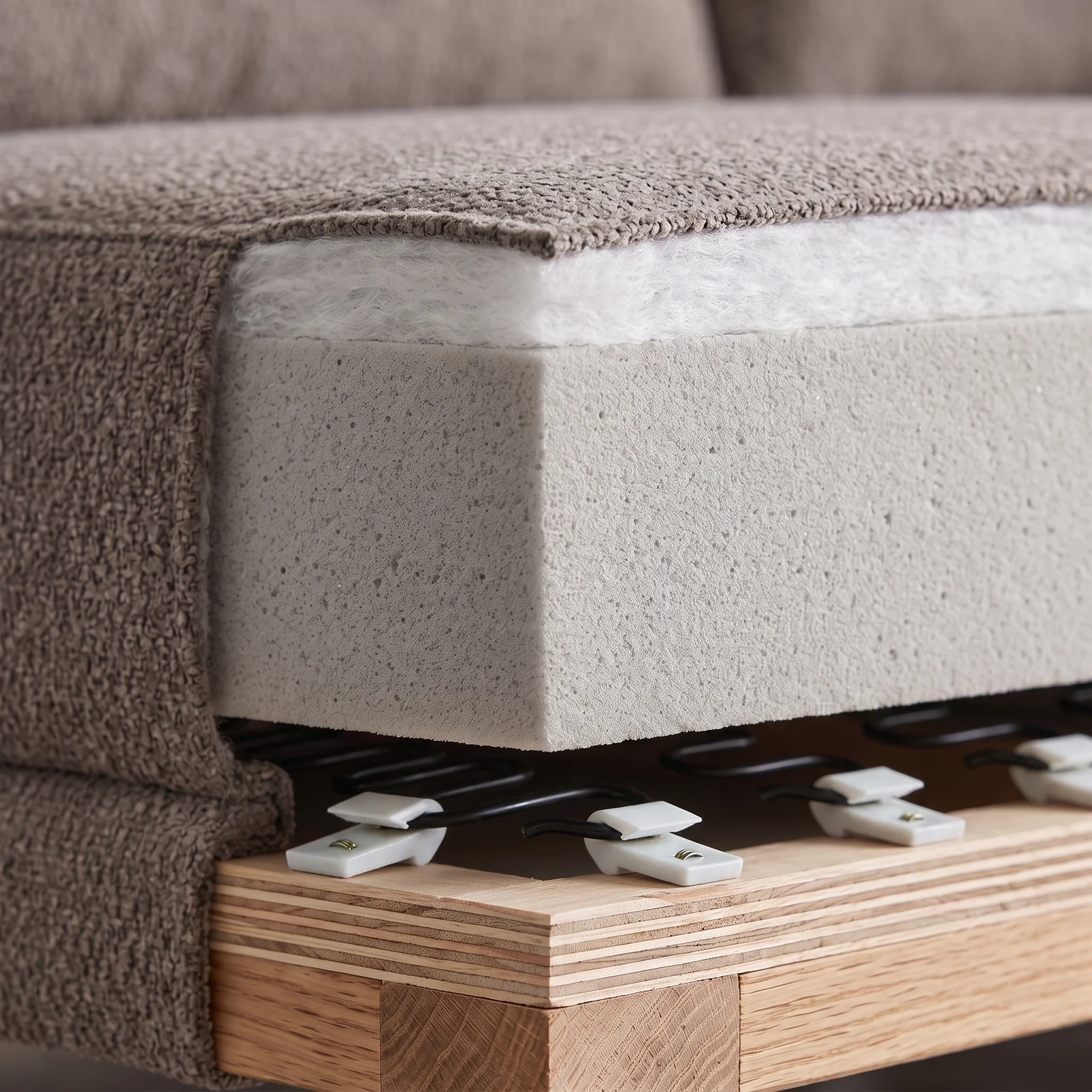 Seat cutaway: the filling layers from fabric to frame