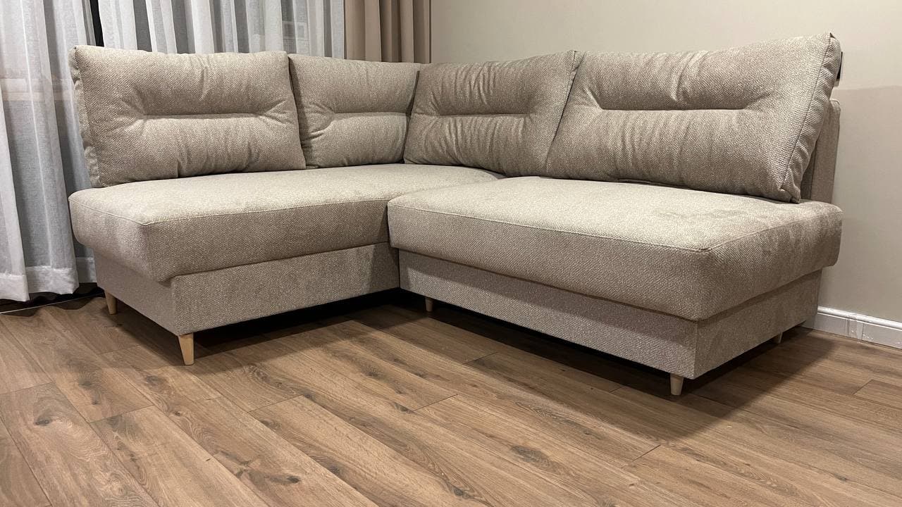 Corner sofa, beige fabric with decorative seams